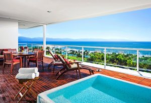 Outdoor deck with seating and plunge pool